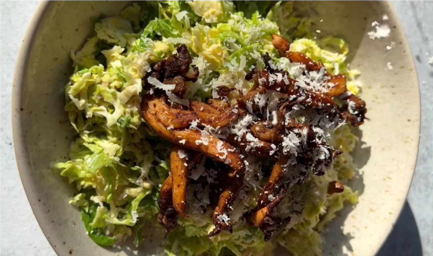Shaved Brussels Caesar Salad with Crispy Oyster Mushrooms