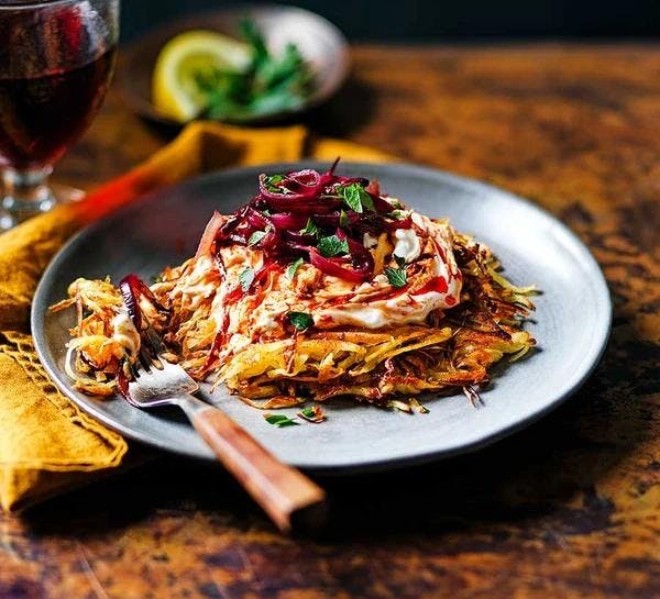 Parsnip rosti with harissa, feta, and caramelised red onions 